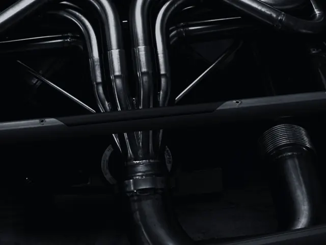 Exhaust headers under a vehicle